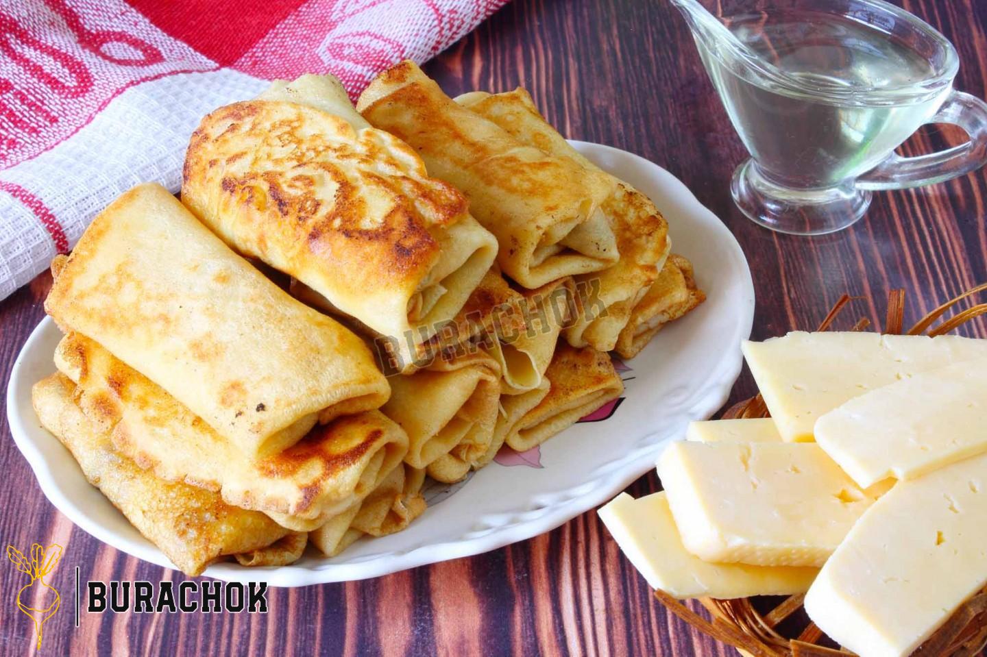 Млинці з куркою, грибами та сиром